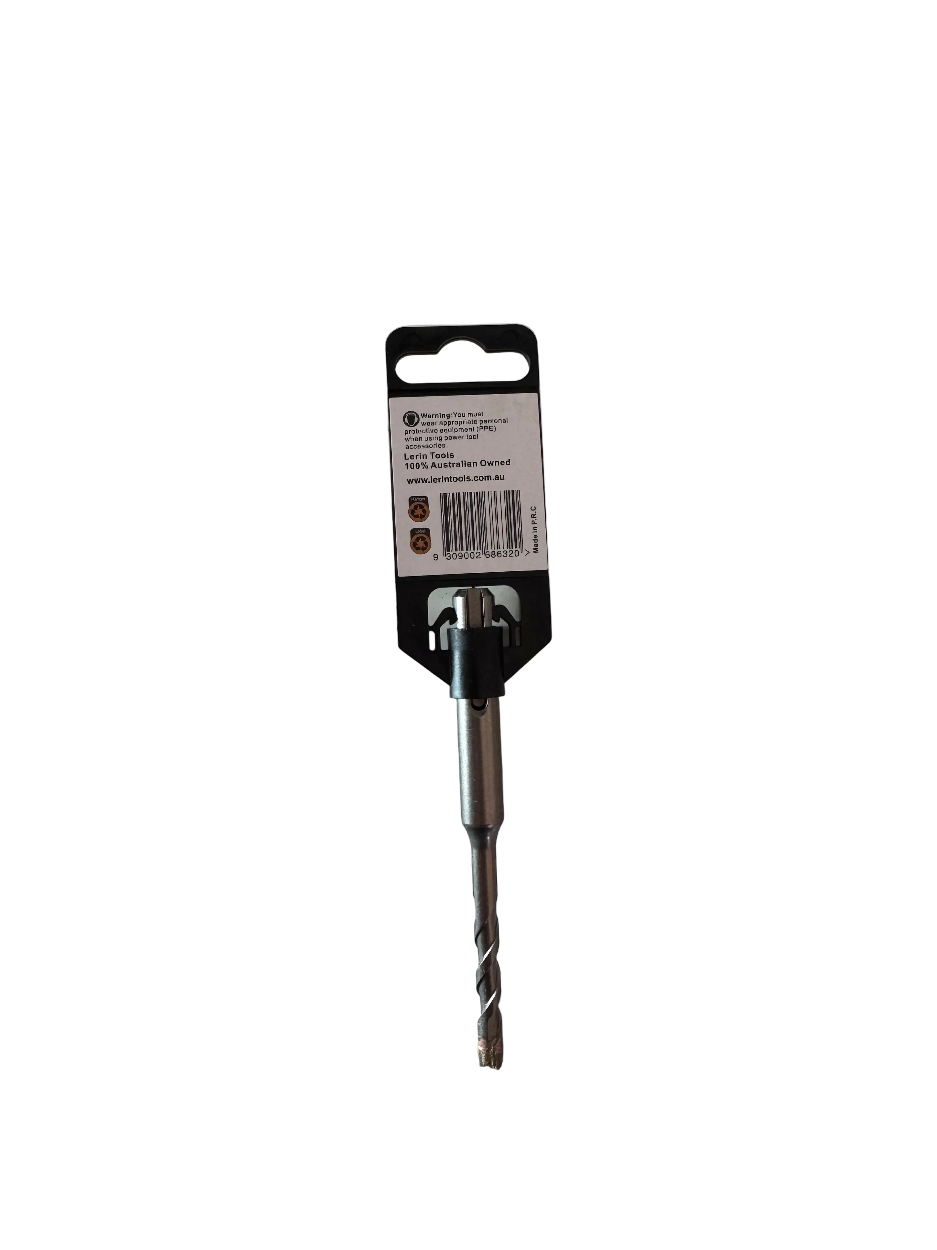 A single metal drill bit with a black and white retail hanger card, photographed on a light gray tabletop. Part of a green and white box is visible in the top-left corner.